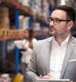 Retail manager reviewing inventory