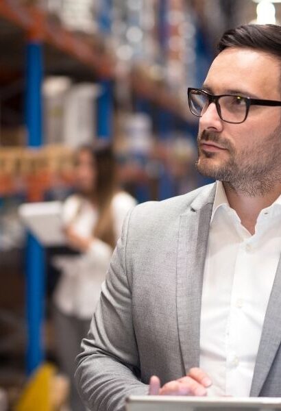 Retail manager reviewing inventory