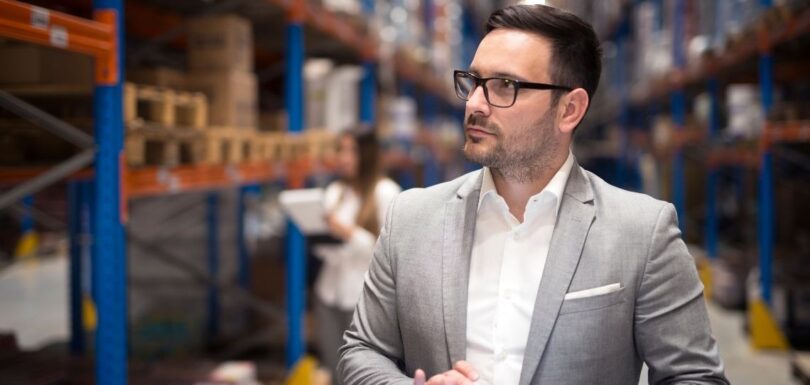 Retail manager reviewing inventory