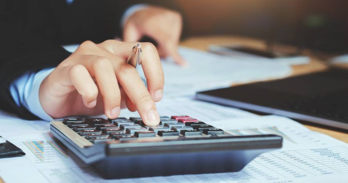 Small business accounting team reviewing financial data